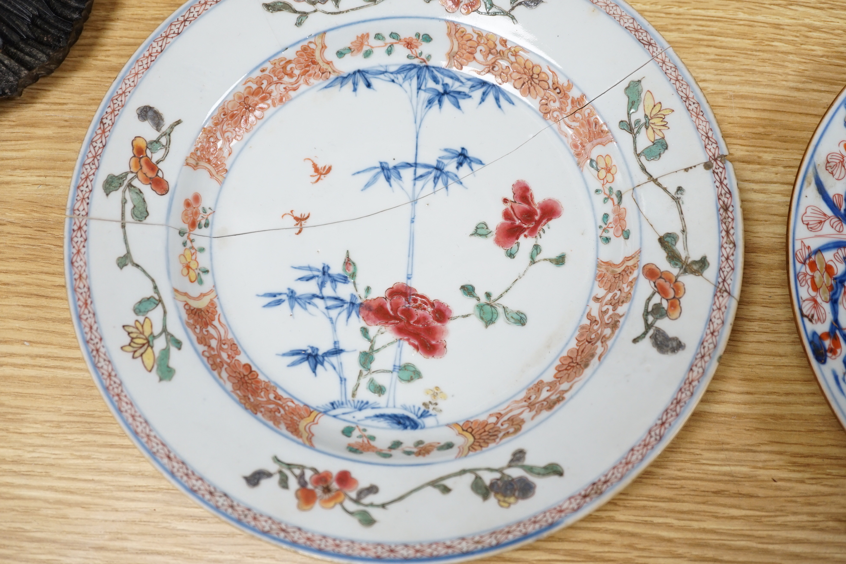 A collection of 18th century Chinese export plates and saucers